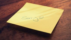 sorry on a sticky note 