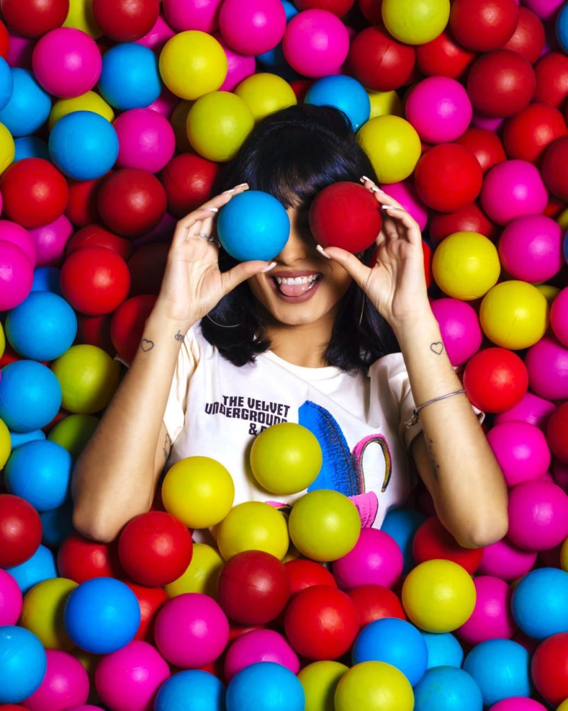 girl in colorful ball pit