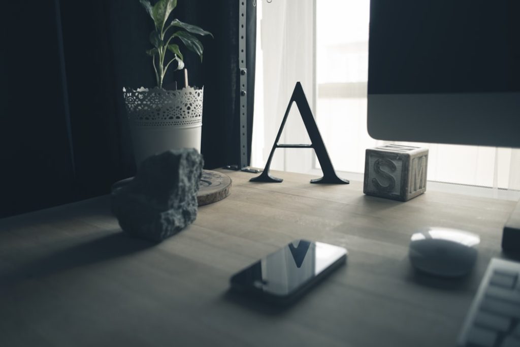 letter A on a desk 