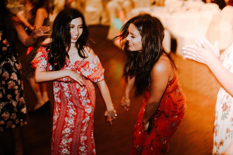 Girls dancing at a party.