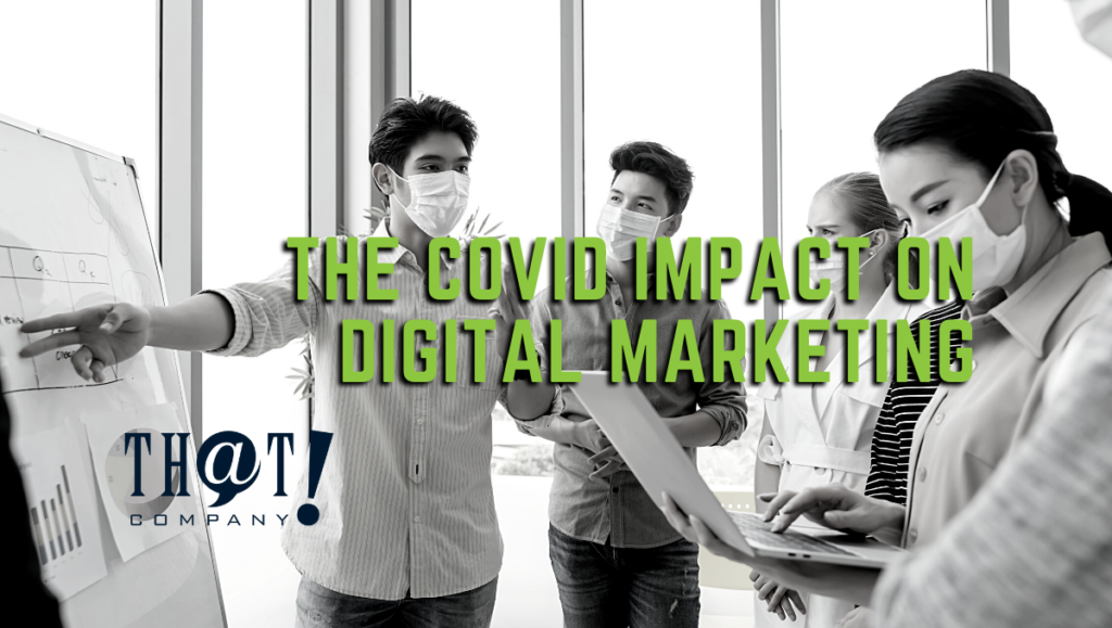 The COVID Impact on Digital Marketing | Co Workers in a Meeting Wearing Masks