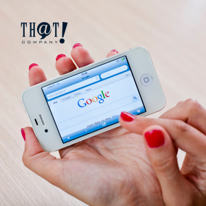 Google Marketing | A Hand Holding A Phone Showing Google Search Bar