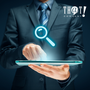 Knowing The Business In a SEO Strategic Plan Setup | A Hand Holding A Tablet with A Hologram of a Magnifying Glass