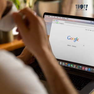 Google Search Engine | A Person Sipping a Coffee In Front Of A Laptop With an Open Google Tab